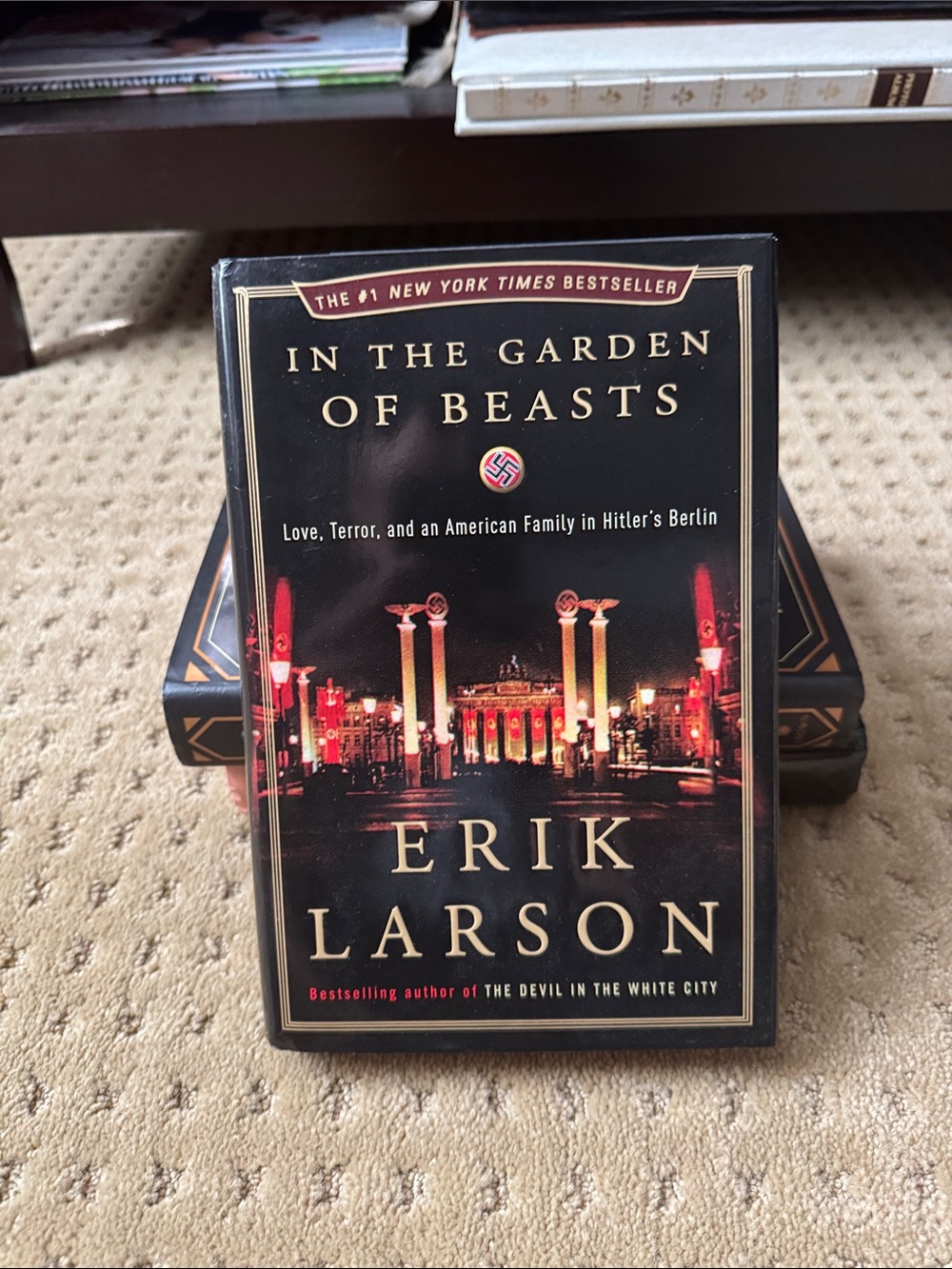 In The Garden of Beasts by Erik Larson - Black & Red Paperback